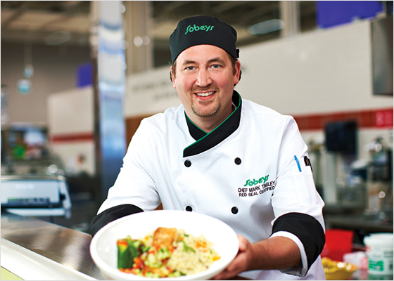 Sobeys chef holding a plate of food