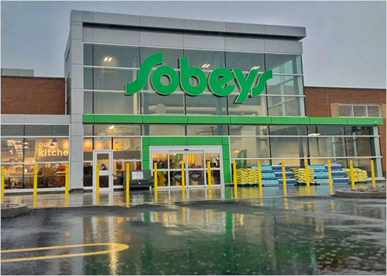Sobeys storefront photo showing a parking lot made with recycled plastic bags